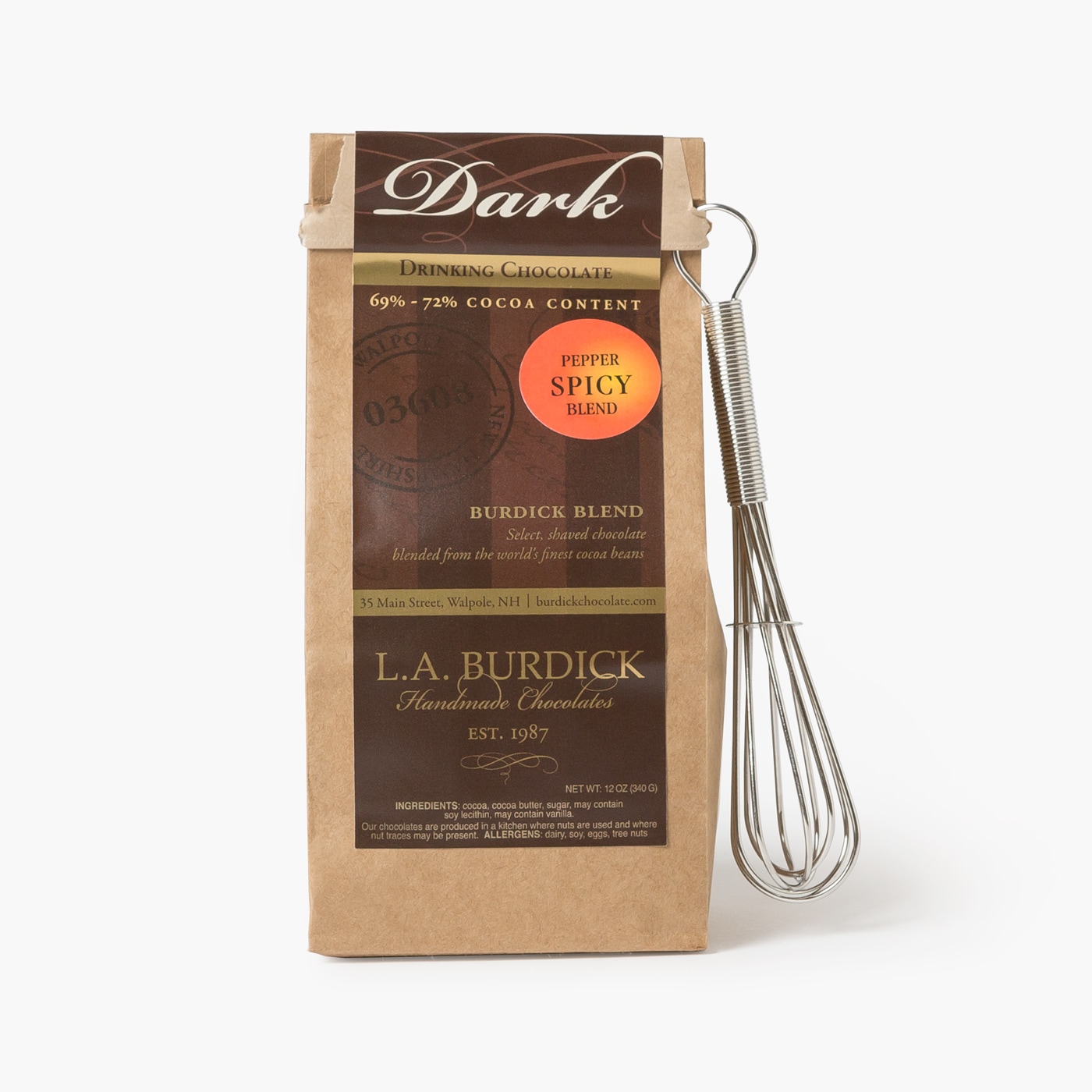 Spicy dark hot chocolate, pictured with included whisk.